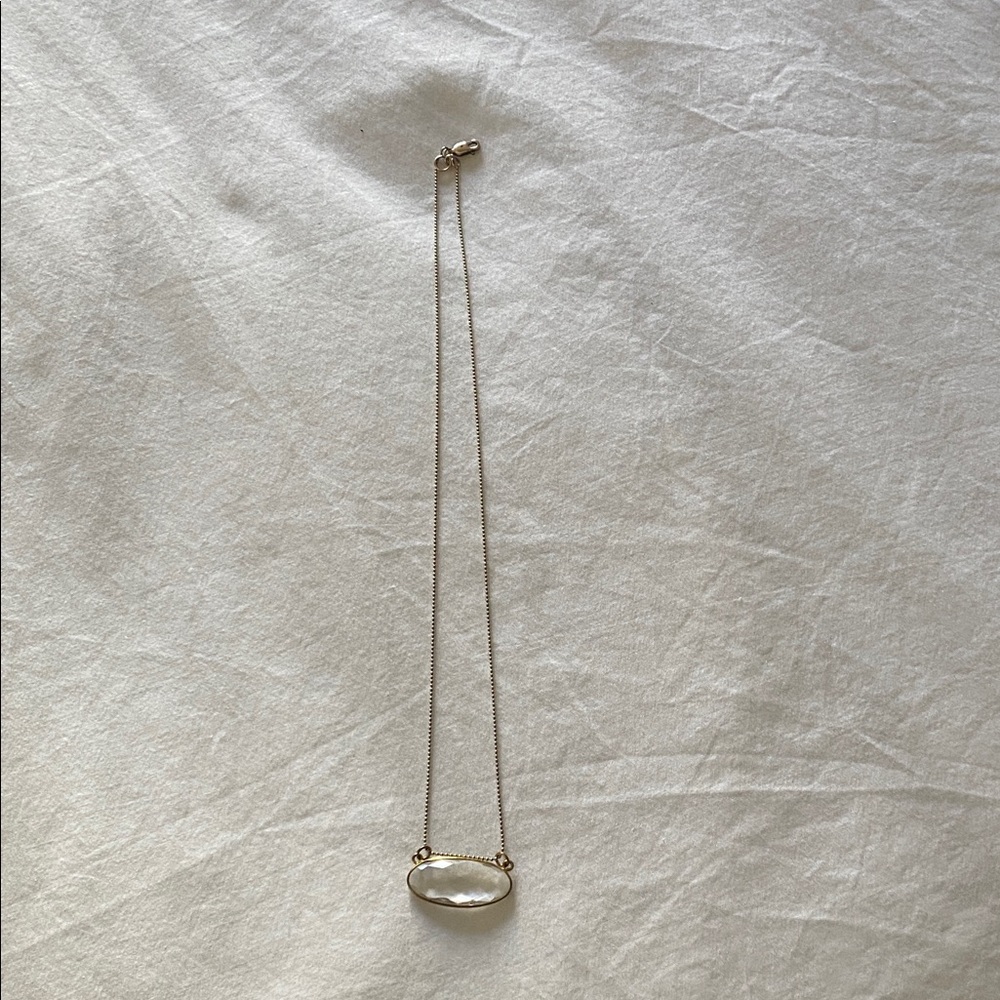 Elegant Gold and Silver Pendant Necklace